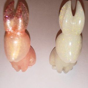 SET OF RESIN RABBITS